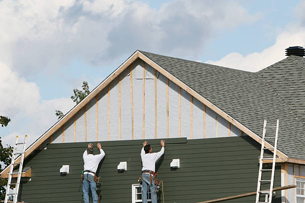 Professional Siding technician working in Dornsife, PA